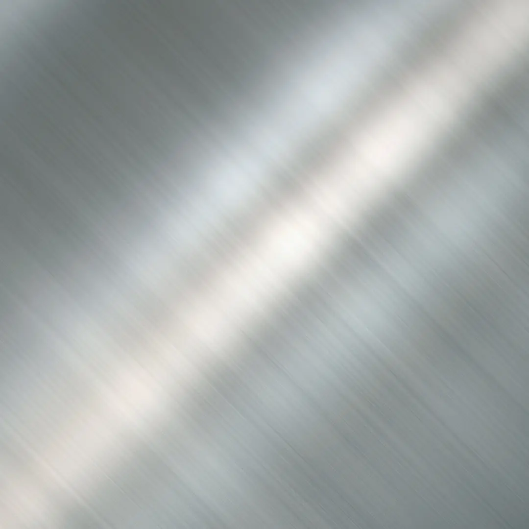 Close-up view of brushed stainless steel surface with diagonal light reflections